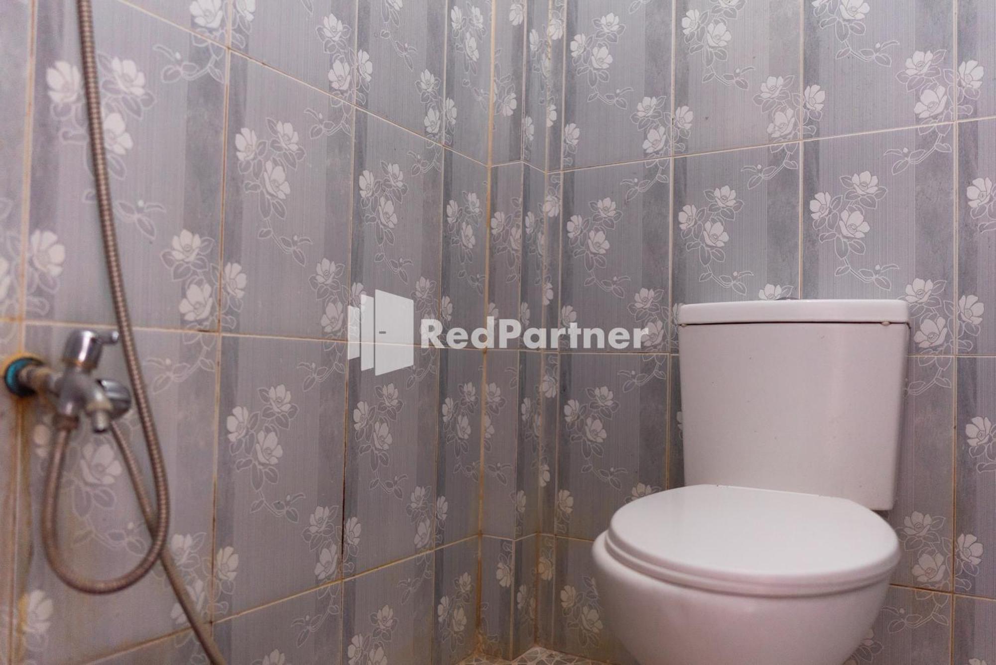 Pondok Kelapa Homestay Lampung Mitra Reddoorz 반다르 람풍 객실 사진